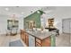 Open concept kitchen with granite counters, stainless steel appliances, and adjacent dining area at 1073 Vinsetta Cir, Winter Garden, FL 34787