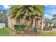 Beautiful landscaping with well-maintained shrubs around the home at 1073 Vinsetta Cir, Winter Garden, FL 34787