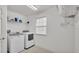 Bright laundry room with new washer and dryer at 1073 Vinsetta Cir, Winter Garden, FL 34787