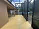 A view of the spacious screened patio with ample room for outdoor entertaining and furniture at 1073 Vinsetta Cir, Winter Garden, FL 34787