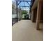 This back porch offers a serene and shaded space, ideal for outdoor relaxation and entertainment at 1073 Vinsetta Cir, Winter Garden, FL 34787