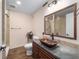 Bathroom with vanity sink and a shower with tile walls and floor at 11 Se 31St St, Ocala, FL 34471
