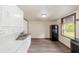 Compact kitchen featuring appliances, and a laundry setup, all efficiently arranged at 11 Se 31St St, Ocala, FL 34471