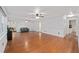 Spacious living room with hardwood floors, neutral walls, and classic trim at 11 Se 31St St, Ocala, FL 34471