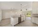 Open kitchen layout featuring granite countertops and stainless steel appliances at 114 Bay Dr, Ocklawaha, FL 32179
