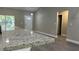 Granite countertop detail highlighting the modern kitchen design with stainless steel appliances and an open floor plan at 114 Bay Dr, Ocklawaha, FL 32179