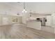 Open concept living room and kitchen with modern finishes at 114 Bay Dr, Ocklawaha, FL 32179