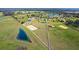 High angle shot showcasing estate's boundaries, ponds, and open fields in a serene, upscale community at 12424 Sw 140Th Loop, Dunnellon, FL 34432