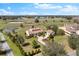 A beautiful aerial view of the estate featuring multiple pastures, horse riding area, and ponds at 12424 Sw 140Th Loop, Dunnellon, FL 34432