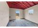 Clean horse stall with rubber flooring and white block walls, offering safety and comfort at 12424 Sw 140Th Loop, Dunnellon, FL 34432
