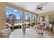 Covered outdoor patio overlooking pool and expansive backyard at 12424 Sw 140Th Loop, Dunnellon, FL 34432