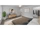 Stylishly staged bedroom with neutral colors, modern décor, and a walk-in closet at 13495 Sw 114Th Ln, Dunnellon, FL 34432