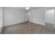Clean and bright bedroom featuring sleek flooring and a spacious walk-in closet at 13495 Sw 114Th Ln, Dunnellon, FL 34432