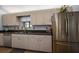 Bright kitchen featuring ample counter space, stainless steel appliances, and lots of storage at 13751 Se 88Th Ct, Summerfield, FL 34491