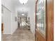 Spacious foyer with tile flooring, a view to the backyard, and stylish decor at 13920 Ne 38Th Ave, Anthony, FL 32617