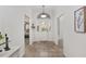 Bright foyer with tile flooring and views of the living spaces, creating a welcoming entrance at 13920 Ne 38Th Ave, Anthony, FL 32617