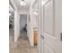 Hallway view showcasing the open floorplan and access to bedrooms and bathrooms at 13920 Ne 38Th Ave, Anthony, FL 32617