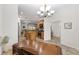 Open concept kitchen and office area with stainless appliances and natural light at 13920 Ne 38Th Ave, Anthony, FL 32617