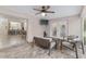 Relaxing covered patio with comfortable seating and an outdoor dining area, ideal for enjoying outdoor living at 13920 Ne 38Th Ave, Anthony, FL 32617