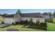 Well-manicured front yard with an attached two-car garage enhance the curb appeal of this inviting home at 14 Juniper Drive Crse, Ocala, FL 34480