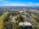A serene aerial view of the property nestled amongst lush greenery, with community features at 231 Ne 28Th Ave # 103, Ocala, FL 34470