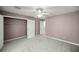 A view of the carpeted bedroom at 25 Lake Wood Cir, Ocala, FL 34482
