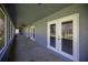 A covered outdoor patio with a view of the backyard at 25 Lake Wood Cir, Ocala, FL 34482