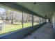A covered outdoor patio with a view of the backyard at 25 Lake Wood Cir, Ocala, FL 34482