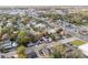 Expansive aerial view of a neighborhood with mature trees and well-maintained streets close to a vibrant downtown area at 30 Se Wenona Ave, Ocala, FL 34471