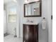Charming bathroom with a vintage-style vanity and bright natural light at 30 Se Wenona Ave, Ocala, FL 34471