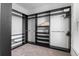 Walk-in closet featuring custom shelving and racks for optimal organization at 30 Se Wenona Ave, Ocala, FL 34471