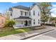 Charming two-story home with a covered porch and landscaped front yard at 30 Se Wenona Ave, Ocala, FL 34471