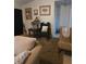 Cozy living room showcasing armchairs, decorative artwork, an entry doorway, and neutral tones offering a comfortable space at 310 Oak Track Dr, Ocala, FL 34472