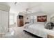 Bedroom featuring neutral walls, carpet floors, and a window seat for added comfort at 411 Sw 38Th St, Ocala, FL 34471