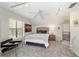 Cozy bedroom featuring soft carpet, stylish furnishings, and a comfortable bed for a relaxing retreat at 411 Sw 38Th St, Ocala, FL 34471