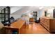 Bedroom with wood floors, desk and chair at 411 Sw 38Th St, Ocala, FL 34471