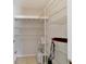 Walk-in closet with installed metal shelving, providing ample storage space at 411 Sw 38Th St, Ocala, FL 34471