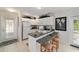 Kitchen featuring a breakfast bar with seating and an open layout with plenty of natural light at 411 Sw 38Th St, Ocala, FL 34471