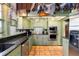 Traditional kitchen featuring granite countertops, stainless steel appliances, and patterned backsplash at 411 Sw 38Th St, Ocala, FL 34471