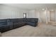Large upstairs bonus room has ample seating and neutral carpet at 5021 Sw 88Th St, Ocala, FL 34476