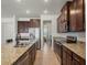 Well-appointed kitchen featuring granite countertops, stainless steel appliances, and ample cabinet space at 5021 Sw 88Th St, Ocala, FL 34476