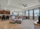 Open-concept living space with plenty of natural light and modern finishes at 5021 Sw 88Th St, Ocala, FL 34476