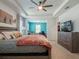 Main bedroom showcases the large windows and neutral color scheme at 5021 Sw 88Th St, Ocala, FL 34476