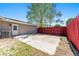 Backyard patio beside the home and fenced perimeter, for comfortable outdoor lounging on the property at 5041 Ne 4Th St, Ocala, FL 34470
