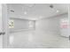 Spacious bonus room featuring tile floors, recessed lighting, and multiple windows at 5041 Ne 4Th St, Ocala, FL 34470