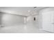 Bright bonus room features white tile flooring, neutral paint, and recessed lighting at 5041 Ne 4Th St, Ocala, FL 34470