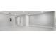 Bright, open bonus room with tile floors and neutral walls offers versatile space at 5041 Ne 4Th St, Ocala, FL 34470