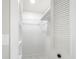 A well-lit closet with organized shelving and a bright interior offers ample storage at 5041 Ne 4Th St, Ocala, FL 34470