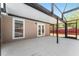 Covered patio with white flooring and an outdoor light fixture at 5041 Ne 4Th St, Ocala, FL 34470