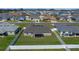 Enjoy this gray home with a fenced backyard, complemented by a well-manicured lawn in a friendly community at 5086 Sw 91St St, Ocala, FL 34476